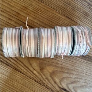 5 skeins Berroco Glacé silky ribbon yarn.